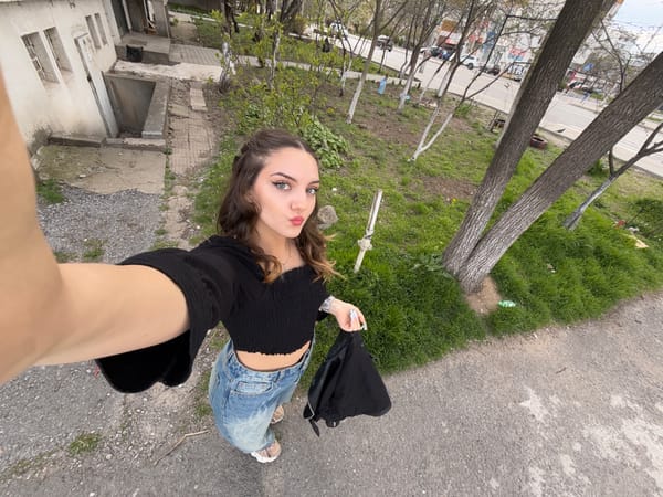 Woman takes selfies outdoors and indoors in Sofia