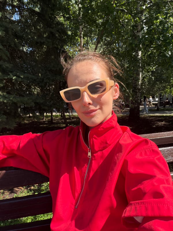 Red jacket, ballerina prints, and selfies in Ufa park