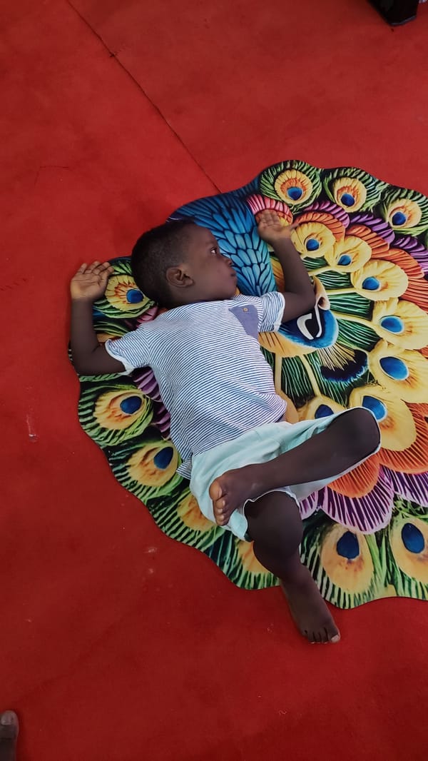 Inside a Nigerian fashion boutique on a busy afternoon