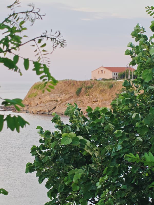 Tsarevo's coastline and harbor at dusk, Black Sea.