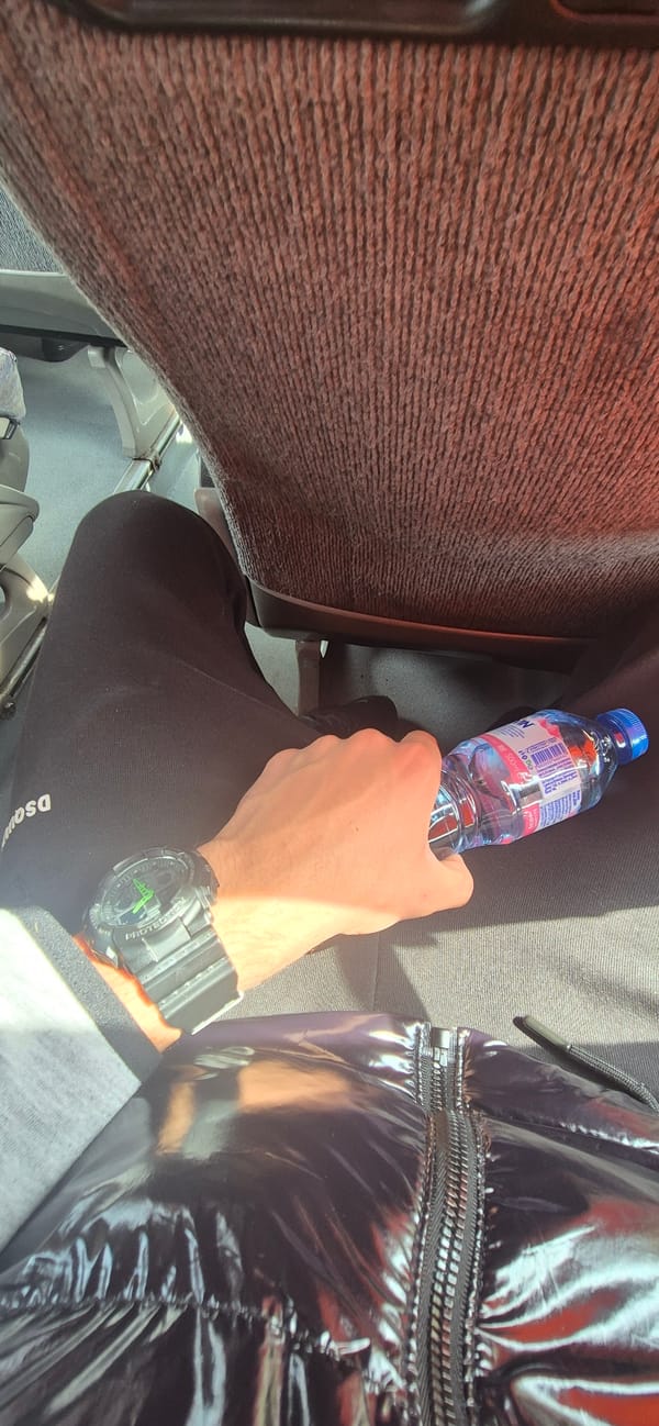 Passenger with water bottle spotted on public transport in Tulovo