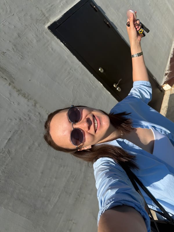 Woman documents personal moments with selfies and flowers in Chaikovsky