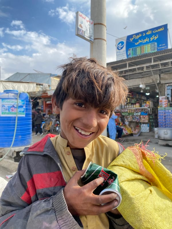 Everyday street life documented in Kandahar commercial districts