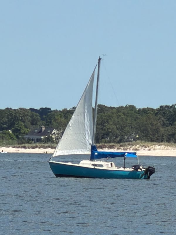 Afternoon on the water in Riverhead, boats and beach in midsummer