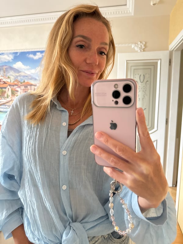 Mirror selfie series with beaded phone charm, Russia