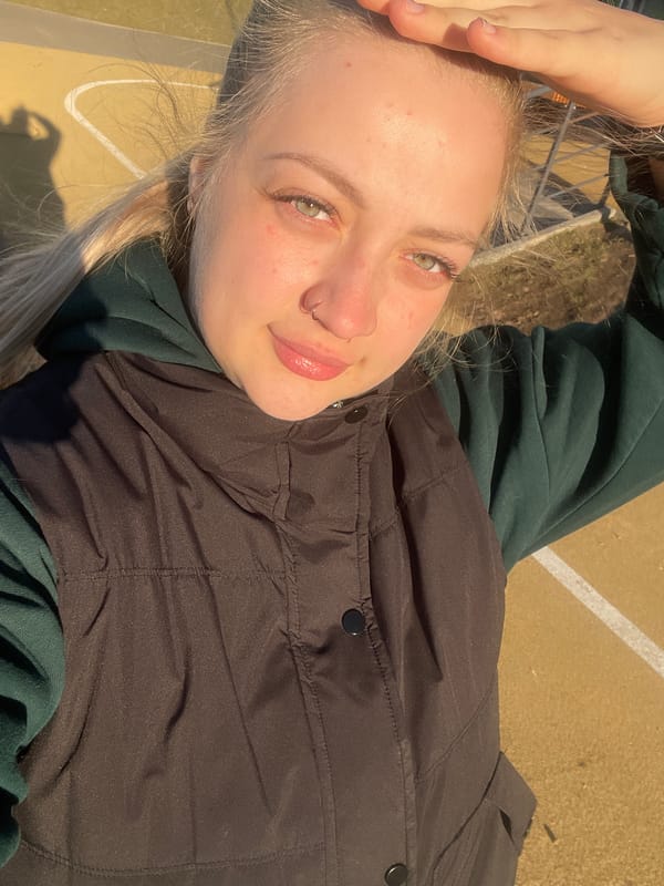 Woman rests on sports court in Izhevsk, Russia