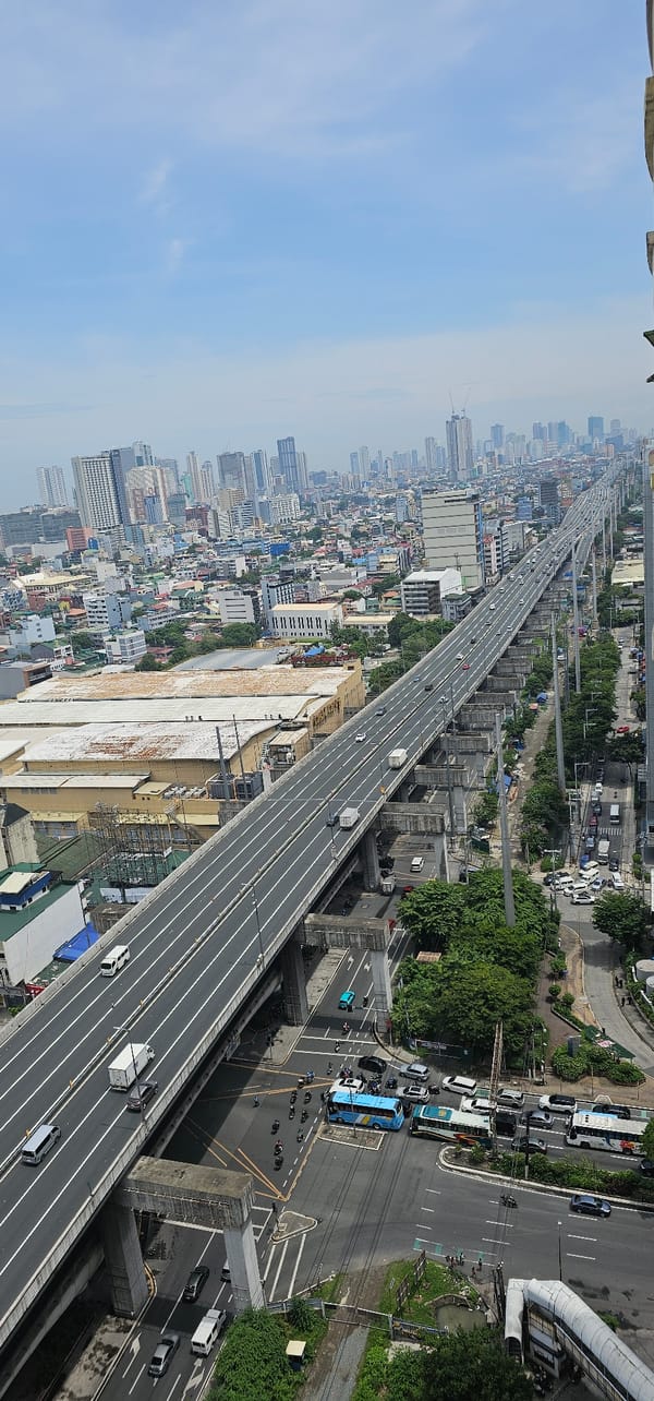 Aerial views of Makati traffic and urban density