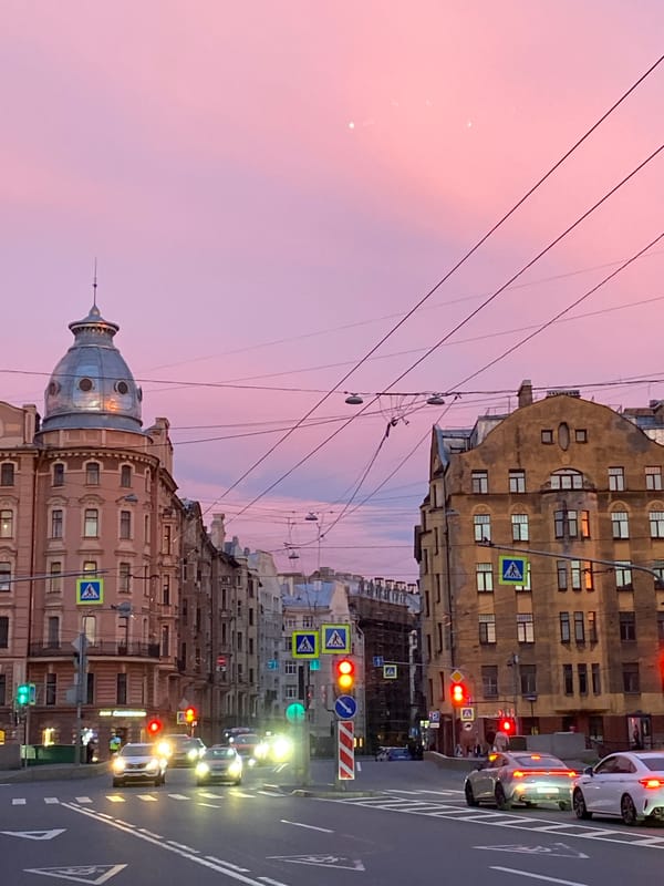 Saint Petersburg glows under a dramatic summer evening sky