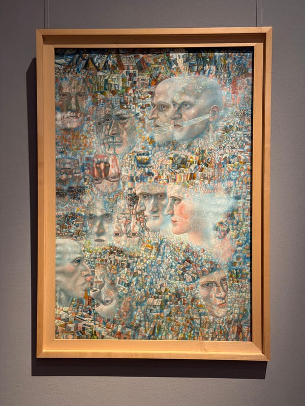 Abstract portrait artwork displayed on wall in Malakhovka