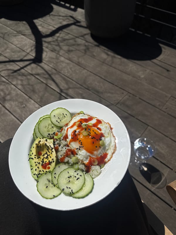 Rice bowls with fried eggs photographed in New York