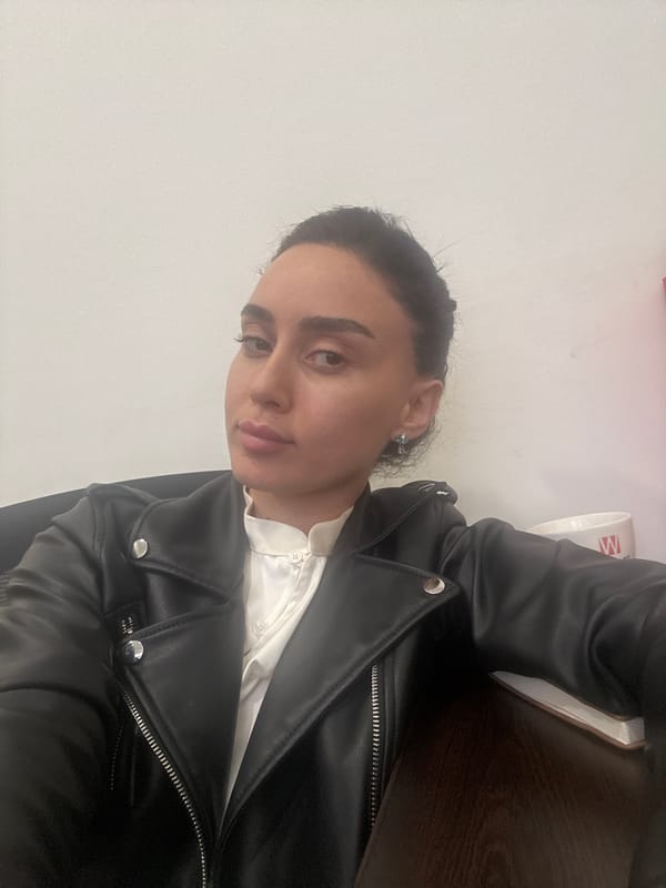 Woman in leather jacket photographed across Tbilisi locations