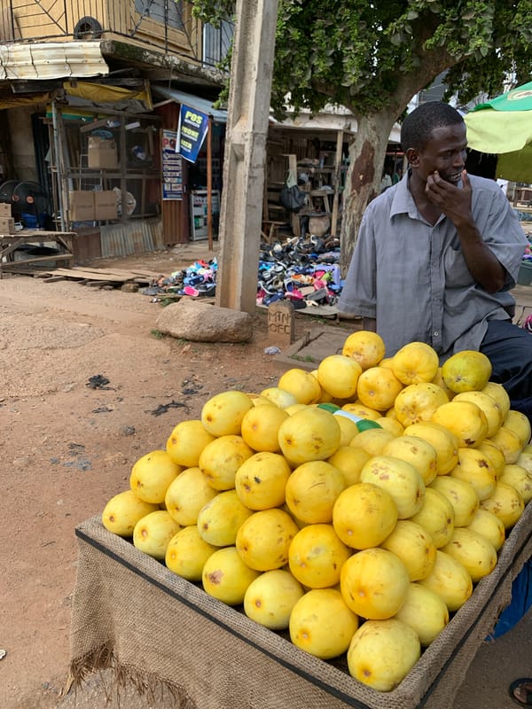 Midday street commerce and vendors in Jos, Nigeria