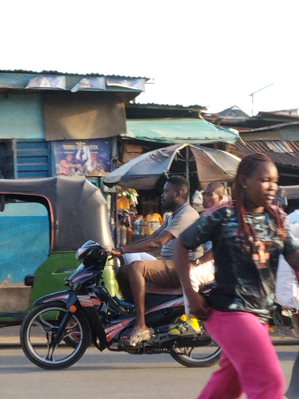 Daily life unfolds on Aba streets during afternoon hours
