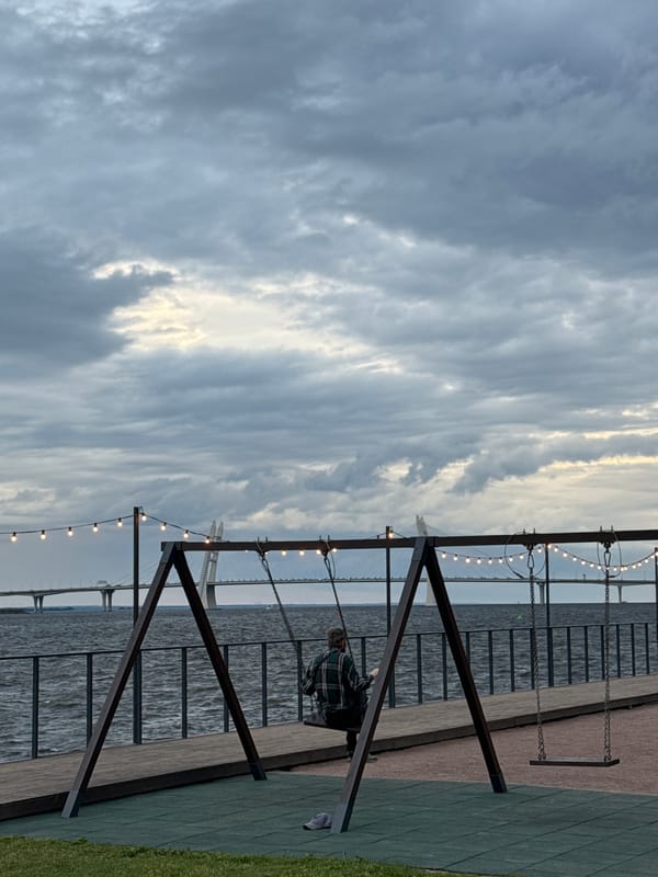 Hanging out at a lit-up industrial waterfront space in Saint Petersburg