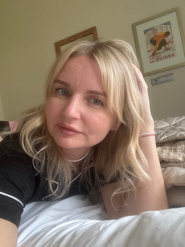 Woman resting in bedroom captured in morning memories, Russia