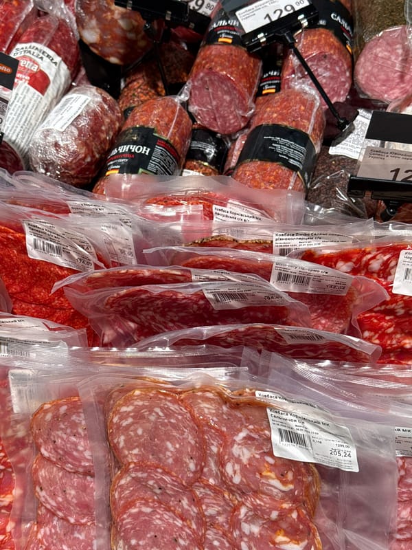 Roaming a European market's produce, deli, and bar sections
