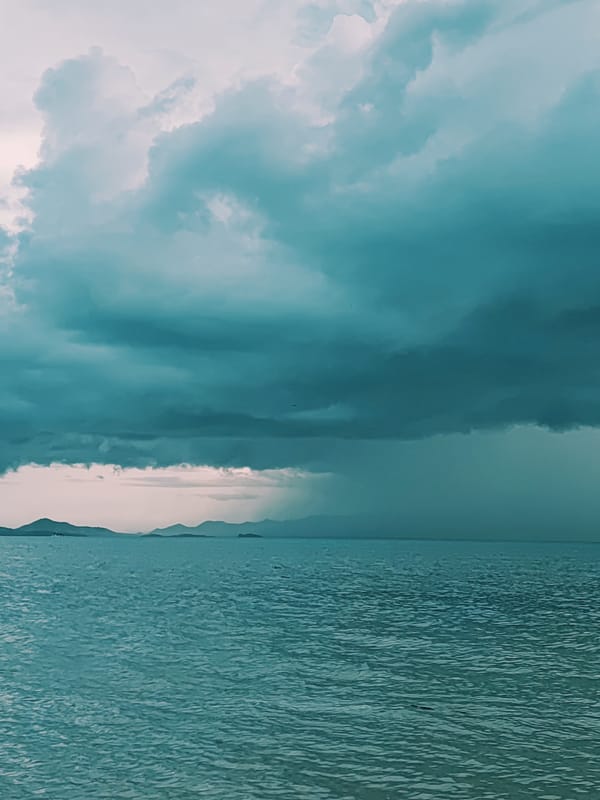 Storm rolling in over the Gulf of Thailand from a beachside view