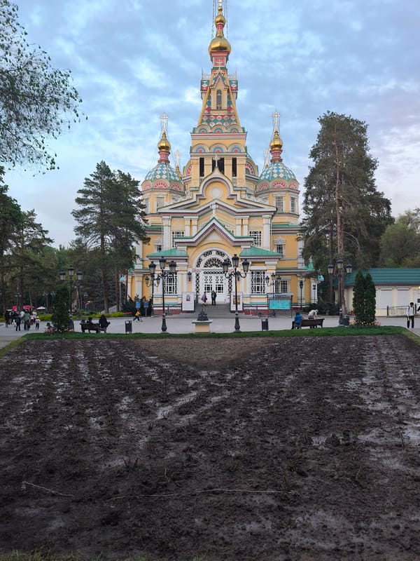 Spring afternoon at Almaty's historic cathedral draws visitors, games