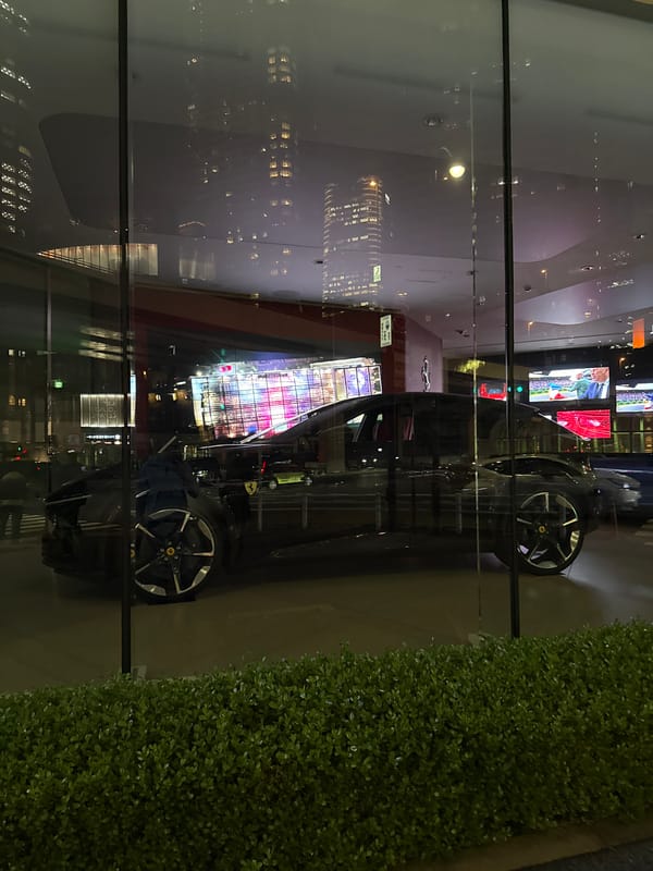 Urban street scenes documented in Minato featuring Ferrari dealership