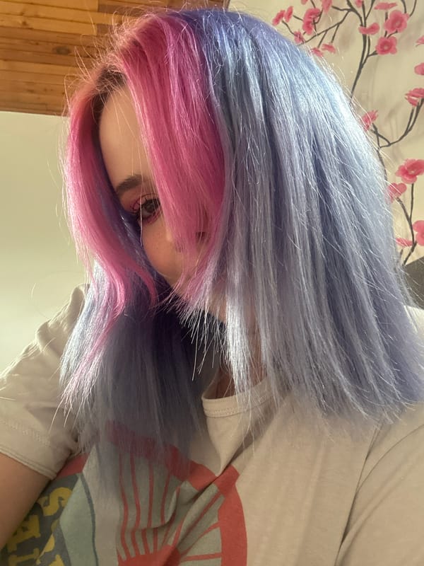 Person with pink-blue hair photographed in Zagreb