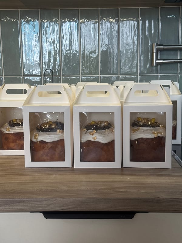 Ornate decorated cakes displayed in Krasnoyarsk bakery or shop
