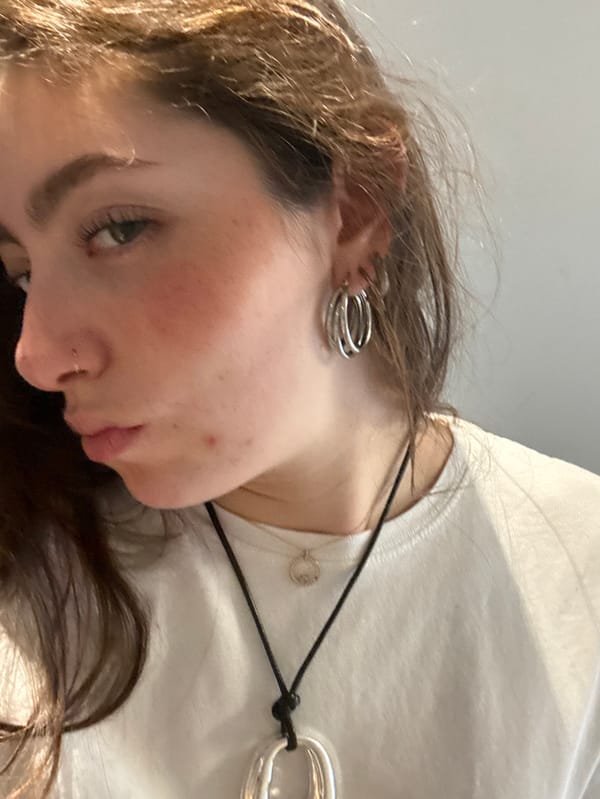 Young woman documents afternoon selfie session in Hull residence