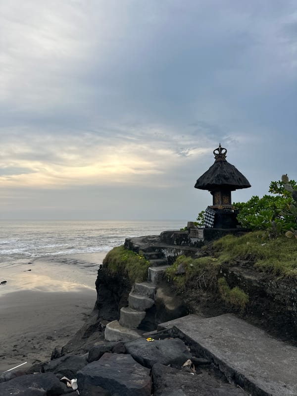 Traditional Balinese shrine observed on coastal cliff in Belalang