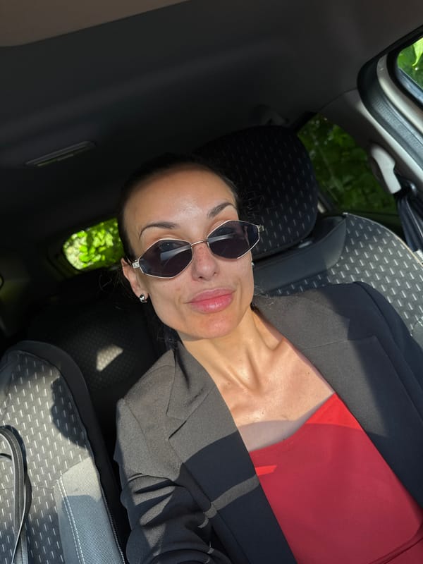 Woman in black blazer observed in car, Pleven