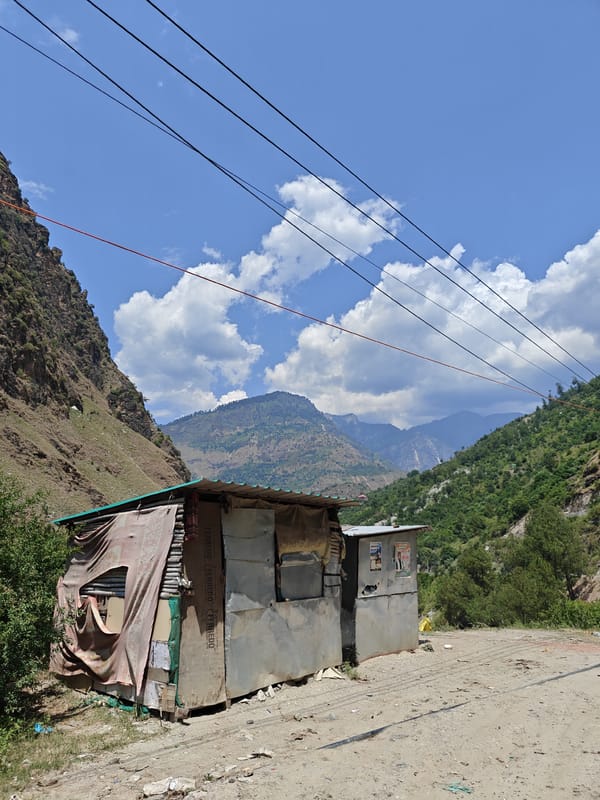 Clear morning skies documented over Indian mountain landscapes