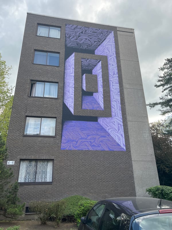 Purple murals spotted on Antwerp residential buildings