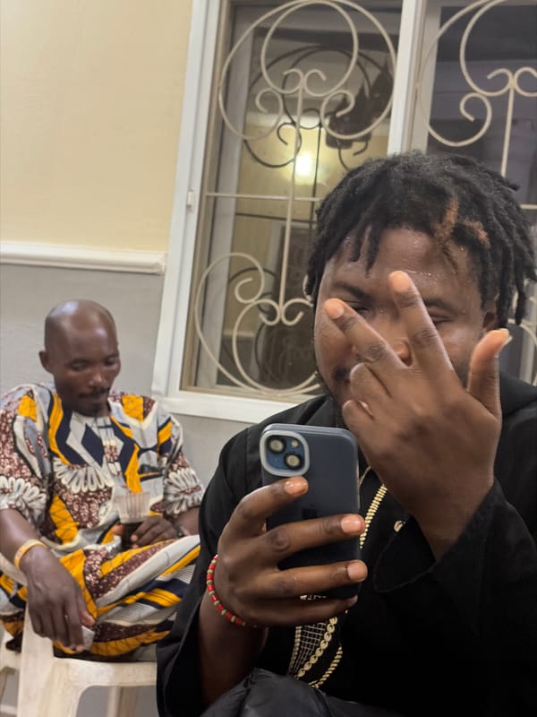 Men share meal and selfies in Jos home