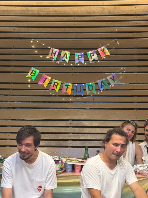 Outdoor birthday party under string lights in Tel Aviv