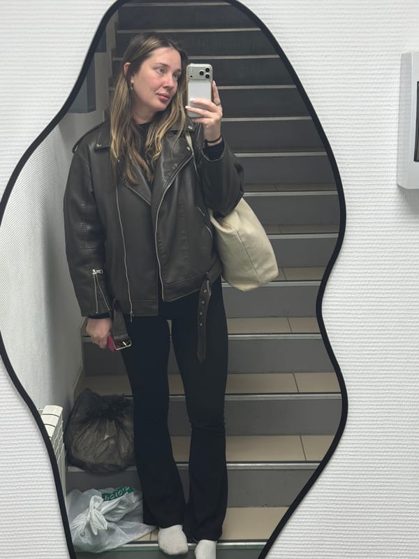 Woman takes multiple selfies at hair salon in Chaikovsky