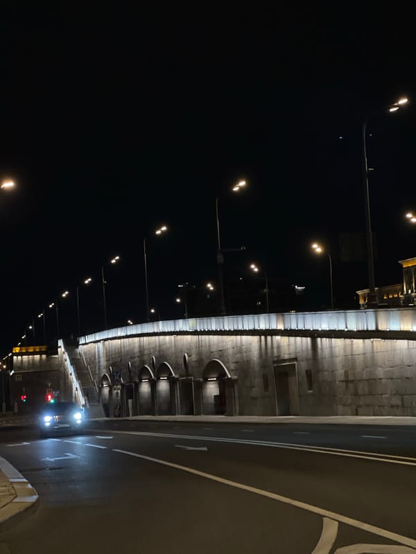 Moscow nighttime architecture observed in tunnel and cylindrical building