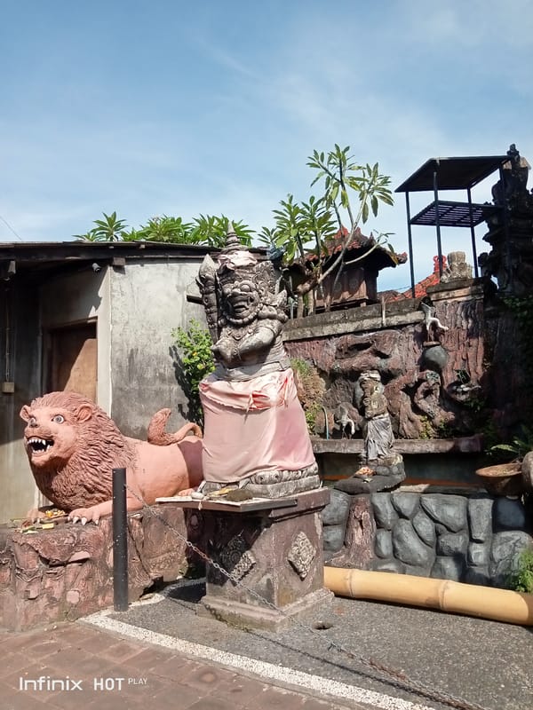Balinese temple complex with guardian statues, Blahbatuh