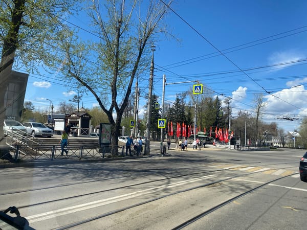 Daily street life documented along Irkutsk tram lines