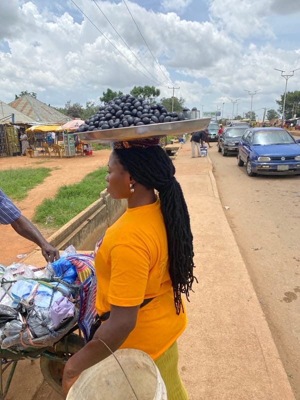 Street life and everyday movement in Bukuru, Nigeria