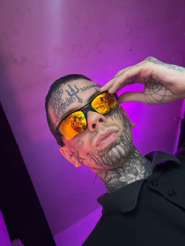 Tattooed figure with reflective shades, multiple angles, Buenos Aires