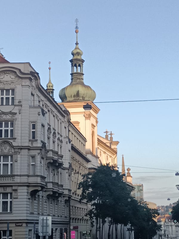 Early morning on Prague's tram corridor near St. Nicholas Church