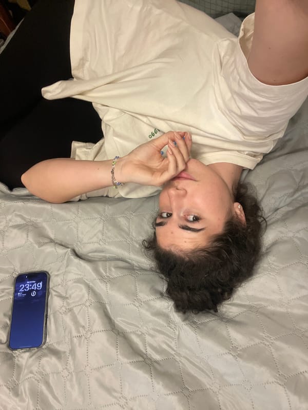 Woman and dog share quiet evening moments in Sofia bedroom