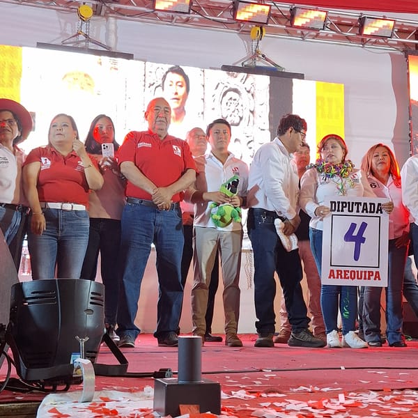 Clown-costumed figure leads political rally in Peru district
