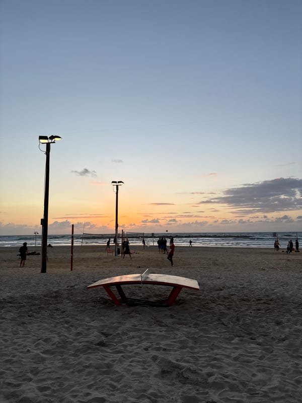 Tel Aviv beachgoers enjoy sunset activities on sand