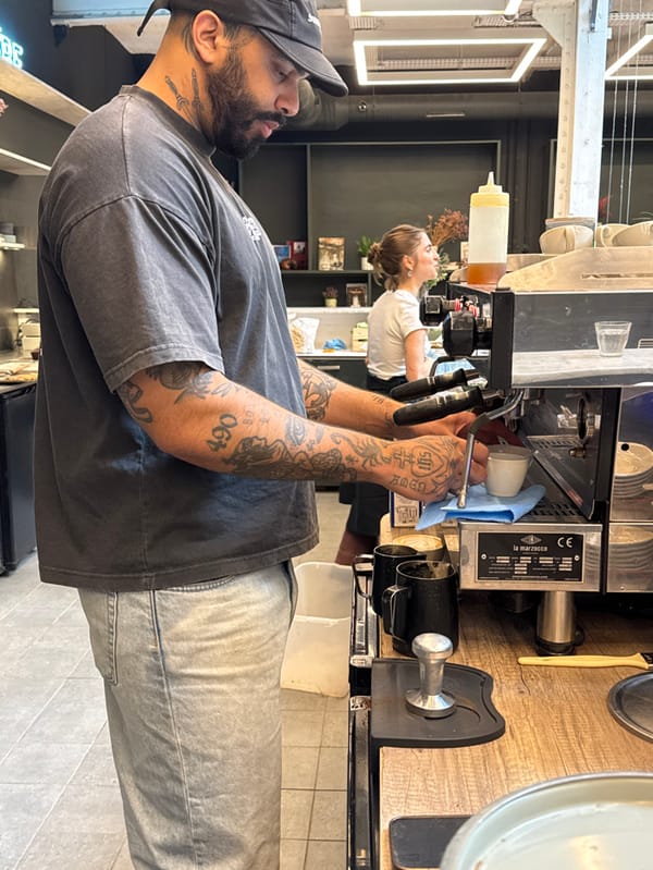 Barista at work in Paris cafe