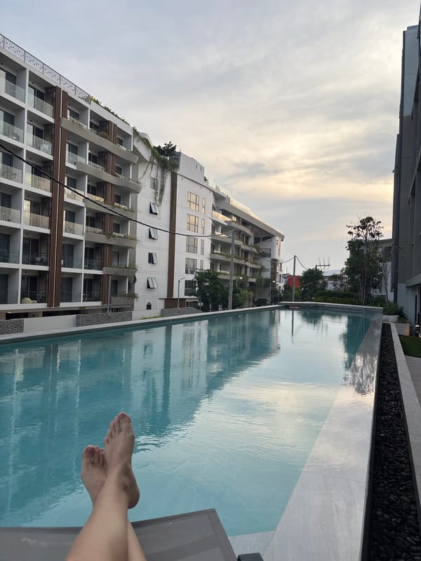 Resort swimmer documented during morning pool session in Thailand