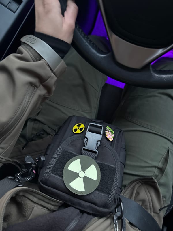 Person with radiation-marked tactical bag observed in Kyiv vehicle