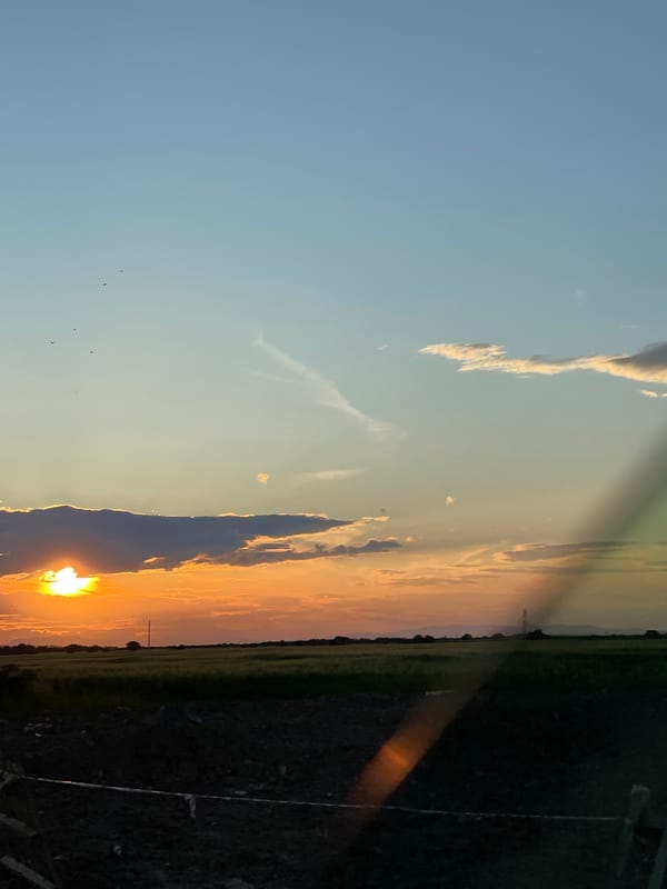 Sunset captured over Orizari, Bulgaria displays colorful evening sky