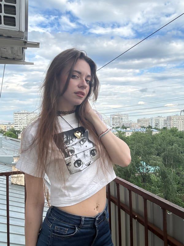 Rooftop photo session documented in central Moscow