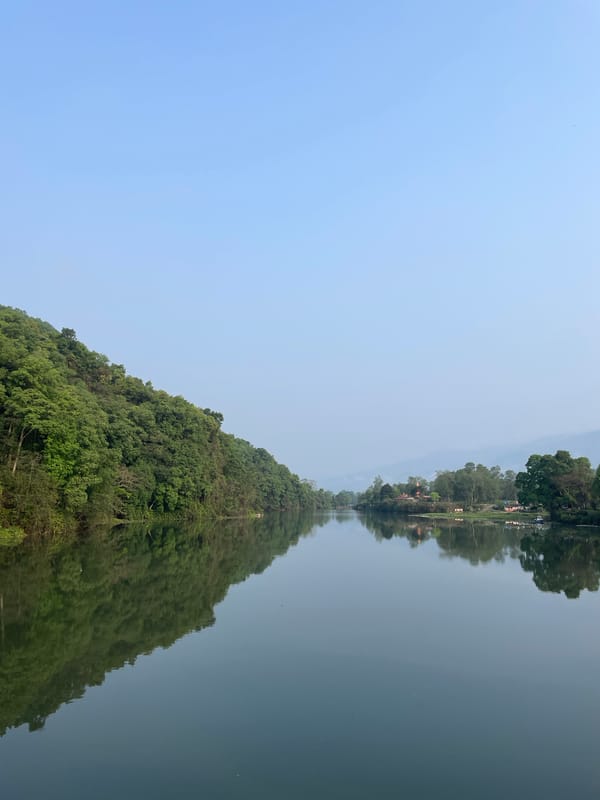 Visitors gather at Phewa Lake in Pokhara, Nepal