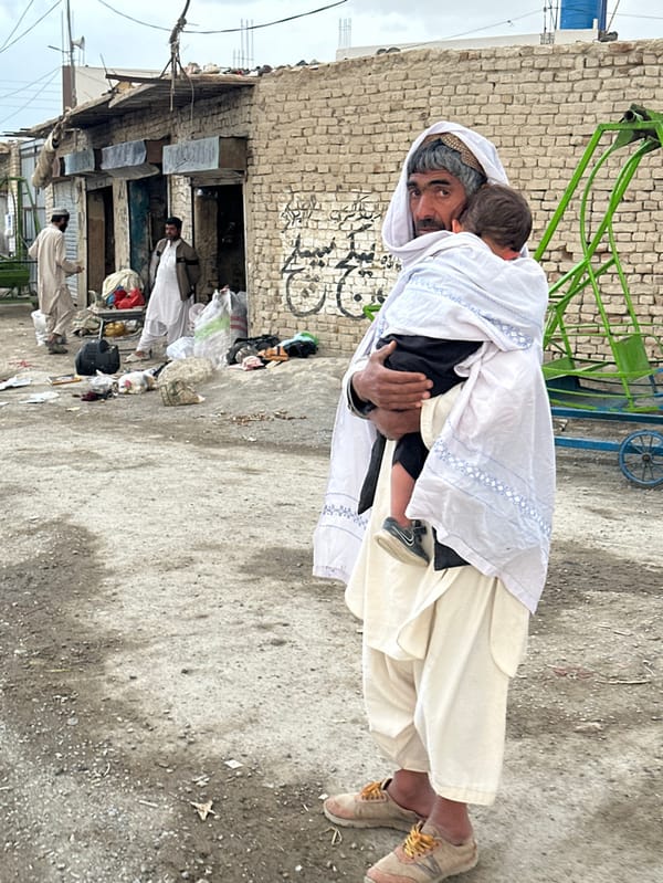 Daily life documented in Quetta streets during overcast afternoon