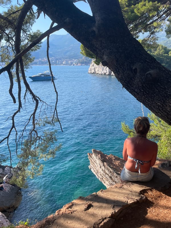 Crowded summer day at Sveti Stefan's beaches and island resort